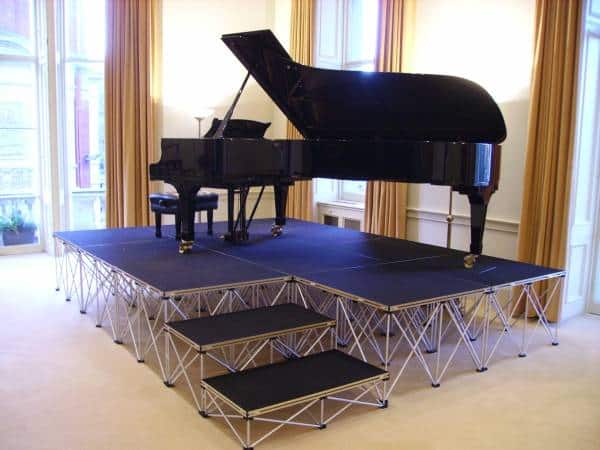 Staging with good weight loading is NexGen Portable staging, which can easily support a grand piano.