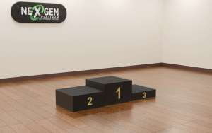 Winners Medal Awards Ceremony Podium Available in 1x1m podiums This stage podium package offers a very quick setup awards podium to elevate your Gold, Silver & Bronze winners. Takes 60 seconds to assemble. Comes in Black Tough Finish or Carpet (for indoors or outdoors) and 200, 400, & 600 & high riser legs. No locks Three-tier black winners' podium with blocks labeled 1 (center), 2 (left), and 3 (right) on a wooden floor; beige walls and a NexGen sign above.