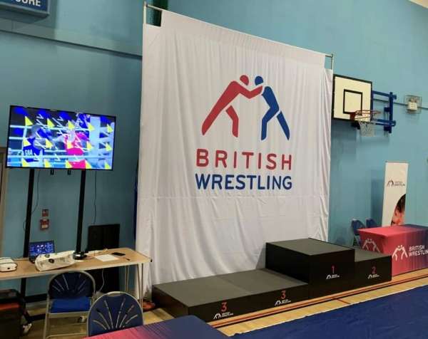 Winners Medal Awards Ceremony Podium Available in 1x1m podiums  This stage podium package offers a very quick setup awards podium to elevate your Gold, Silver & Bronze winners. Takes 60 seconds to assemble. Comes in Black Tough Finish or Carpet (for indoors or outdoors) and 200, 400, & 600 & high riser legs. No locks Portable stage winners podium platform made in the UK by NexGen Staging - Sheffield