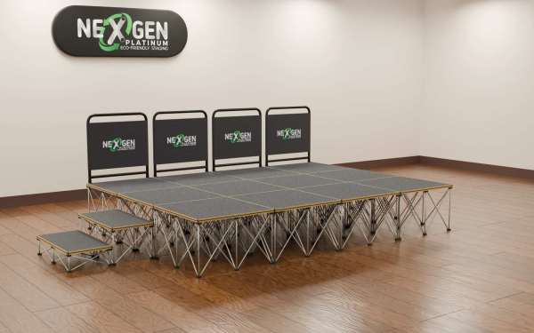 NexGen SteelCity Modules - (4×3m Stage Package) Choose Any Surface and any height combo.A medium‑sized, professional staging solution with magnetic simplicity and Sheffield‑engineered strength.Fast magnetic assembly: 12 super‑fast magnetic connection deck panel modules  — no locks, no tools, no fuss.Package contents: (12) 1×1m SteelCity deck platforms with risers at your choice of height.Finish options: Choose 3mx4m 600mm high w/steps + Handrails Rear