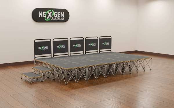 5mx3m_600high+200mm400mmstep+handrail_side - NexGen Portable Staging & Dancefloors NexGen SteelCity Modules - (5×3m Stage Package) Choose Any Surface and any height combo.A medium‑sized, professional staging solution with magnetic simplicity and Sheffield‑engineered strength.Fast magnetic assembly: 15 super‑fast magnetic connection deck panel modules — no locks, no tools, no fuss.Package contents: (15) 1×1m SteelCity deck platforms with risers at your choice of height.Finish options: Choose