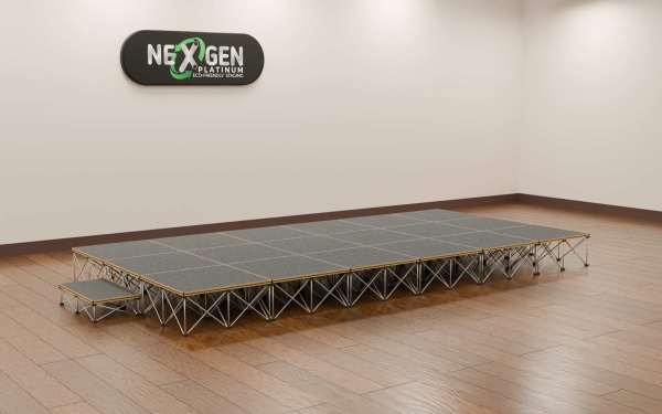 6mx3m_400high+200mmstep_side - NexGen Portable Staging & Dancefloors NexGen SteelCity Modules - (6×3m Stage Package) Choose Any Surface and any height combo.A medium‑sized, professional staging solution with magnetic simplicity and Sheffield‑engineered strength.Fast magnetic assembly: 18 super‑fast magnetic connection deck panel modules — no locks, no tools, no fuss.Package contents: (18) 1×1m SteelCity deck platforms with risers at your choice of height.Finish options: Choose