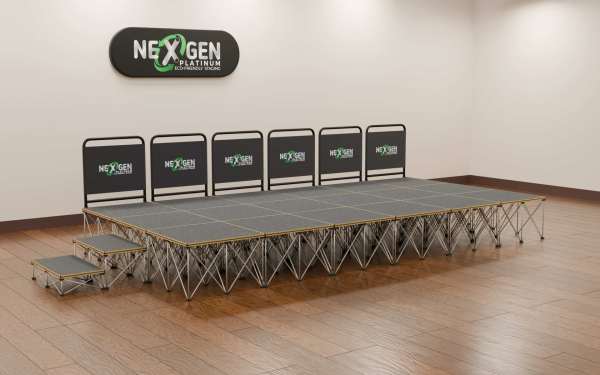 6mx3m_600high+200mm400mmstep+handrail_side - NexGen Portable Staging & Dancefloors NexGen SteelCity Modules - (6×3m Stage Package) Choose Any Surface and any height combo.A medium‑sized, professional staging solution with magnetic simplicity and Sheffield‑engineered strength.Fast magnetic assembly: 18 super‑fast magnetic connection deck panel modules — no locks, no tools, no fuss.Package contents: (18) 1×1m SteelCity deck platforms with risers at your choice of height.Finish options: Choose