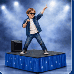 Young boy performing on a stage with a microphone, wearing sunglasses and a denim jacket, raising one arm in the spotlight.